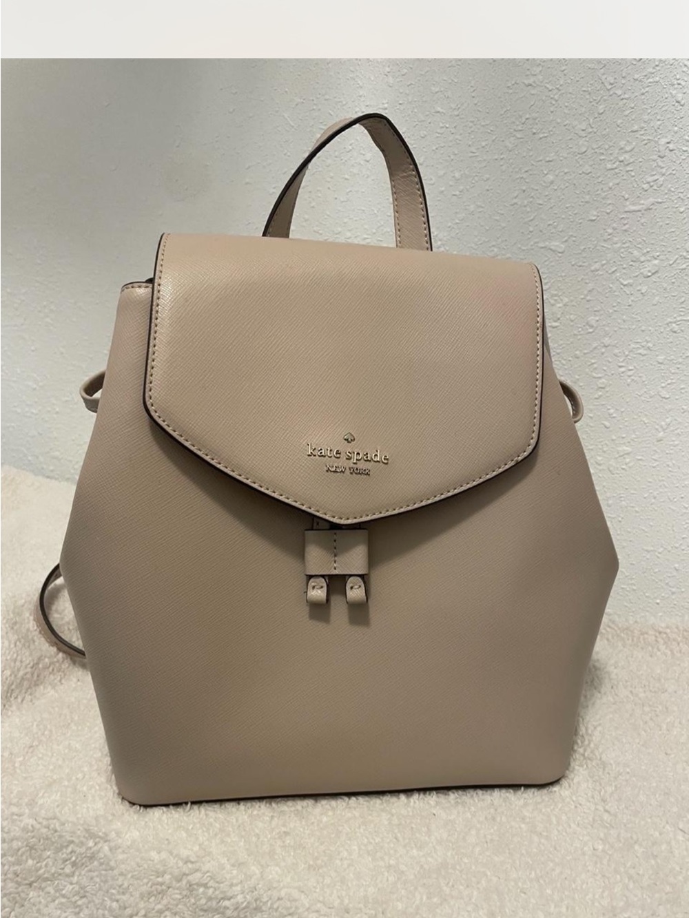 kate spade beige leather flap backpack